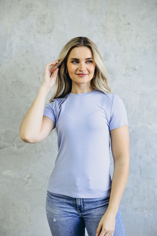 High neck ribbed tee in light shade of lilac with short sleeves.