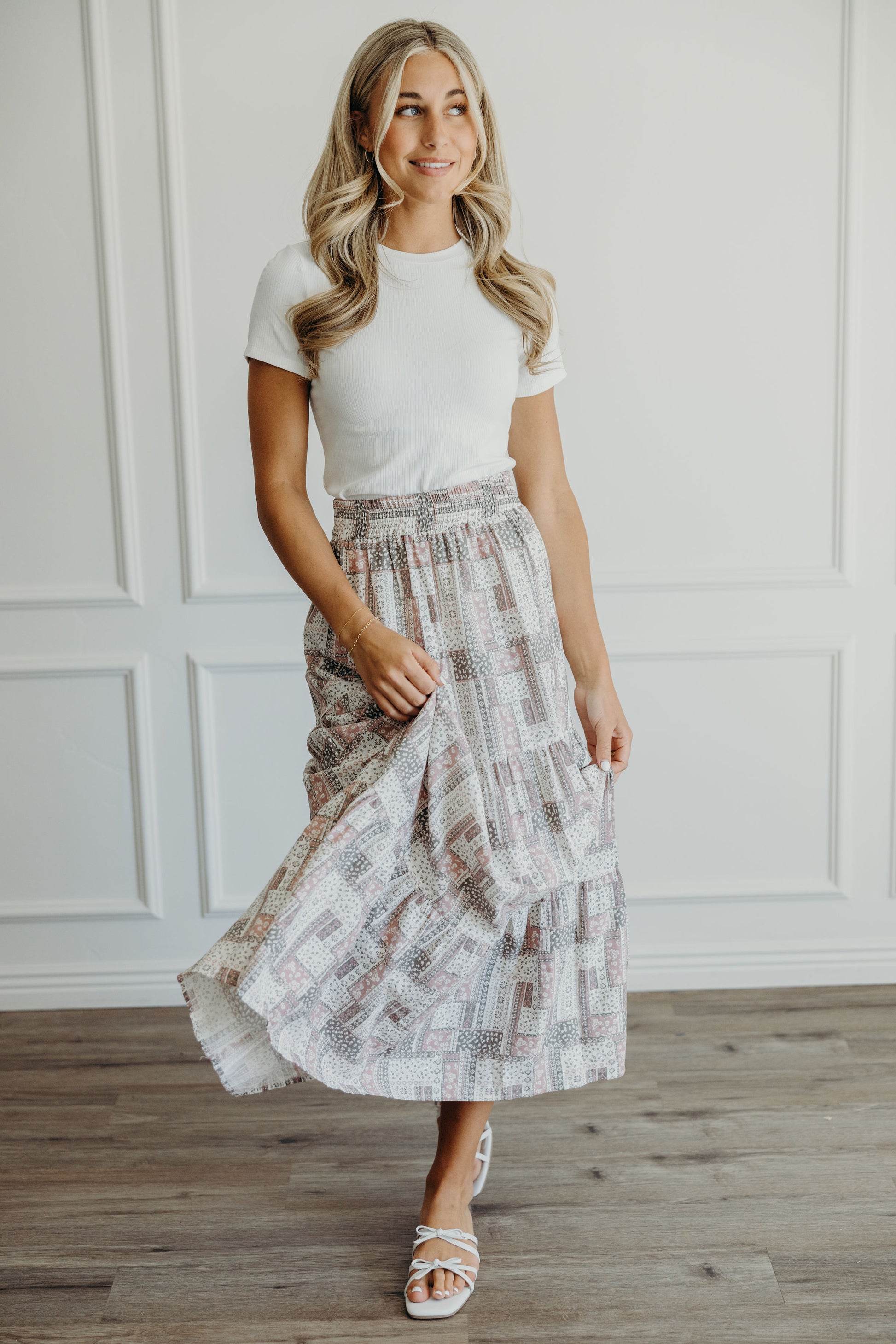 Maxi length skirt with patchwork pattern and elastic waist.