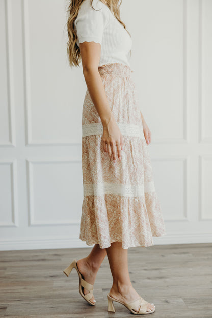 Midi length tiered skirt with lace detail and ruched waist.