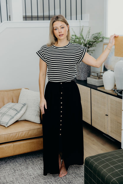 Boxy fit striped tee with short sleeves and high neckline.